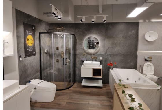Shower enclosure, wall-hung WC and bath tub setup on display
