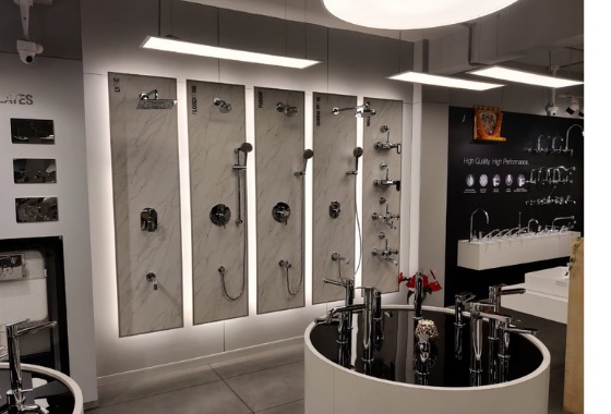 Wall-mounted shower systems and CP fittings display