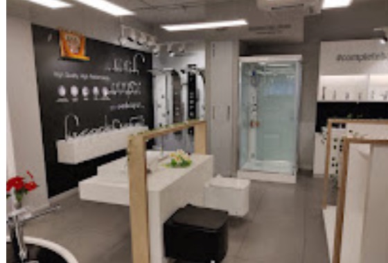 Wash basins, vanities and shower cubicle in the showroom